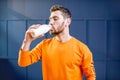 Sports man drinking milk Royalty Free Stock Photo