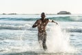 Sports man running in water Royalty Free Stock Photo