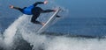 Sports man surfing wave on surfboard