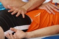 Sports massage therapists work. Royalty Free Stock Photo