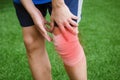 Sports person injured leg in the sport field