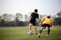 Sports and recreation concept two male soccer players attending regular practice sessions and memorizing attack and defense