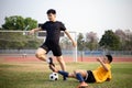 Sports and recreation concept two male soccer players attending regular practice sessions and memorizing attack and defense