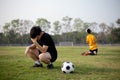 Sports and recreation a moment of victory and defeat of two players after the football match Royalty Free Stock Photo