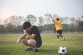 Sports and recreation a moment of victory and defeat of two players after the football match Royalty Free Stock Photo