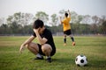 Sports and recreation a moment of victory and defeat of two players after the football match Royalty Free Stock Photo