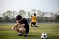 Sports and recreation a moment of victory and defeat of two players after the football match Royalty Free Stock Photo