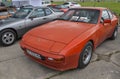 Sports red German car Porsche 944 during the Old Car Land Festival