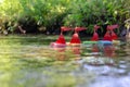 Sports regatta of children`s toy ships on the creek. Five homema Royalty Free Stock Photo