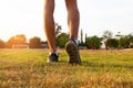 Sports runner feet with sunlight - healthy concept