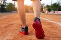 Sports runner feet with sunlight - healthy concept