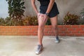 Sports runner with some muscle pain or leg injury