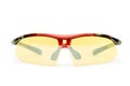 Sports and safety glasses made of black plastic with yellow glasses, shot on a white Royalty Free Stock Photo