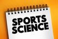 Sports Science is a discipline that studies how the healthy human body works during exercise, text concept text on notepad Royalty Free Stock Photo