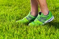 Sports Shoes Sneakers On A Fresh Green Grass Field.