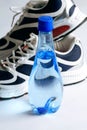 Sports shoes and water bottle Royalty Free Stock Photo