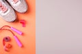 Sports sneakers, jump rope, centimeter and whistle