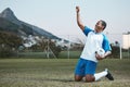 Sports, soccer ball and man celebrate goal on field for competition or training outdoor. Black male athlete football