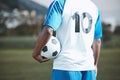 Sports, soccer ball and man with uniform number on a field for exercise, fitness and training outdoor. Football club