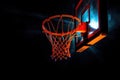 Sports Spectrum Basket: Vibrant beams accentuate a basketball hoop, creating a sports spectrum against a dark tapestry Royalty Free Stock Photo