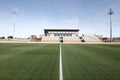 Sports stadium with green grass Royalty Free Stock Photo