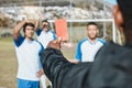 Sports team, red card and soccer referee outdoor on field for game foul, mistake or compliance. Football player, athlete Royalty Free Stock Photo