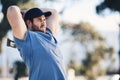 Sports, training and man throw axe on range for adventure, exercise and target practice competition. Extreme sport Royalty Free Stock Photo