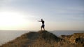 Sports training on open air, muscular pugilist male practicing boxer punches before sparring on workout on hill near sea