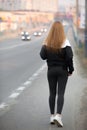 Sports walking on the city bridge Royalty Free Stock Photo