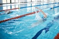 Sports, water splash or woman training in swimming pool for a race competition, exercise or cardio workout. Fast swimmer Royalty Free Stock Photo