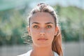 Sports, winner mindset and a portrait woman on outdoor tennis or badminton court before practice game. Health, fitness Royalty Free Stock Photo