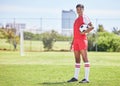 Sports, woman athlete and soccer player training at stadium grass football field with goal post. Determined exercise Royalty Free Stock Photo