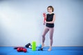 Sports woman exercising with a resistance band. Slim girl in good shape. People, sport and fitness concept. Exercise bands working Royalty Free Stock Photo