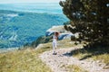 Sports workout. Morning running outdoors. Sport, fitness. Sporty woman running along forest trail. Mountains landscape Royalty Free Stock Photo