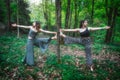 Sports yoga pose with planes practiced by couple of girl friends