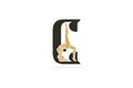 Sports yoga women in letter E vector design. Alphabet letter icon concept. Sports young women doing yoga exercises with letter E