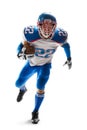 Sportsman in action. American football. Young agile american football player running fast towards goal line. Sports Royalty Free Stock Photo