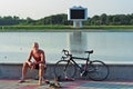 Sportsman bicyclist has a rest Royalty Free Stock Photo