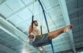 The sportsman during difficult exercise, sports gymnastics Royalty Free Stock Photo