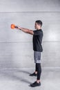 Sportsman doing kettlebell swings Royalty Free Stock Photo