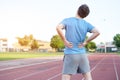 Sportsman feeling backache because of slipped disc