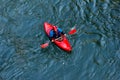 sportsman kayaker comes down on a kayak along the mountain river Belaya in Adygea in the autumn time, the top view