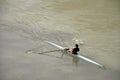 Sportsman kayaking on the Tiber river in Rome Royalty Free Stock Photo