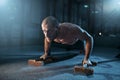 Sportsman makes pushups exercises on training Royalty Free Stock Photo