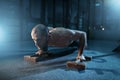 Sportsman makes pushups exercises on training Royalty Free Stock Photo