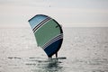 sportsman practices wingfoil, in the mediterranean sea. Royalty Free Stock Photo