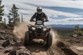 Sportsman quad bike racer riding off-road track on mountain. Generative AI Royalty Free Stock Photo