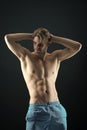 Sportsman with sexy torso and chest. Athlete with fit body in shorts. Man with six pack and ab muscles. Training and Royalty Free Stock Photo