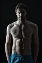 Sportsman with torso and chest. Training and workout activity in gym. Man with six pack and ab muscles. Athlete