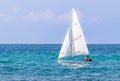 A sportsman on small sailing yacht trains on the Mediterranean Sea near the coast of Nahariyya in Israel